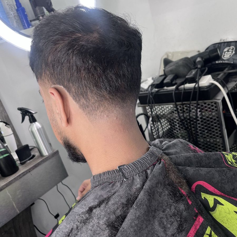 Sharp men's fade and styling at RYAN STYLES barbershop