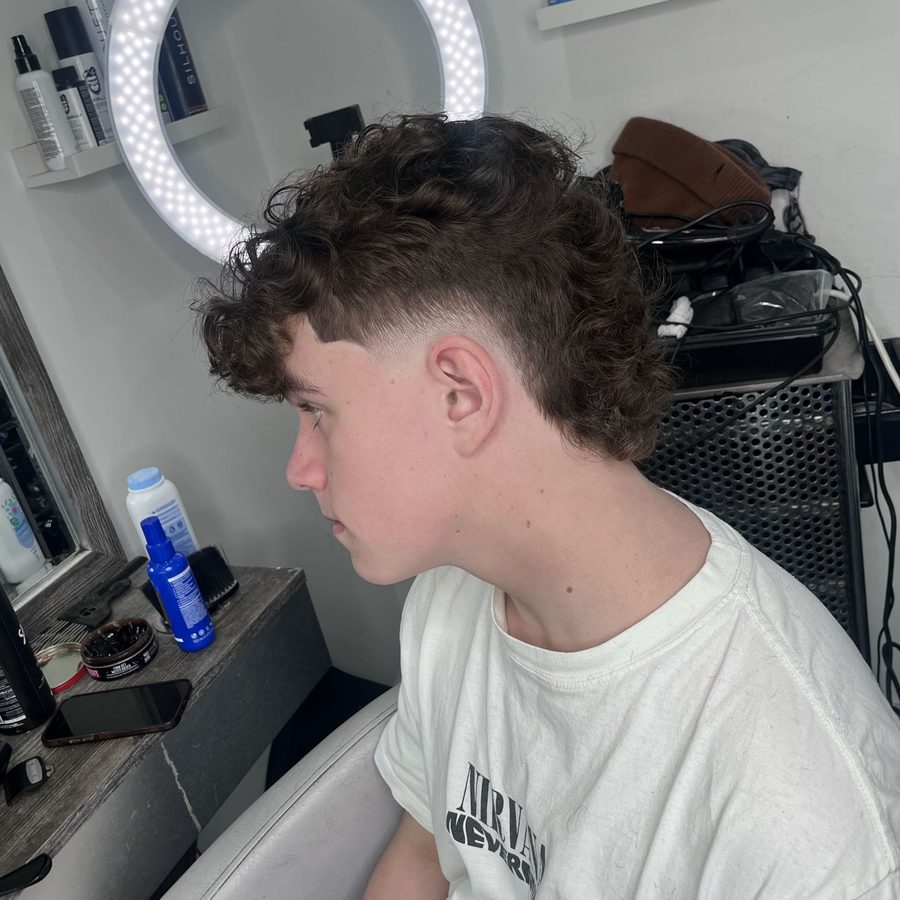 Tapered fade haircut at RYAN STYLES barbershop